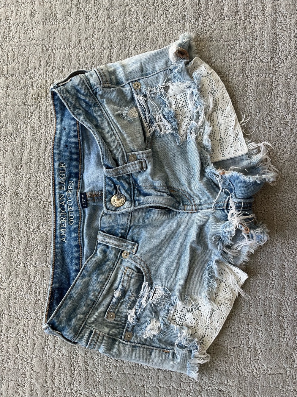 American Eagle Super Low Shortie Distressed Denim Shorts in Blue Size 2